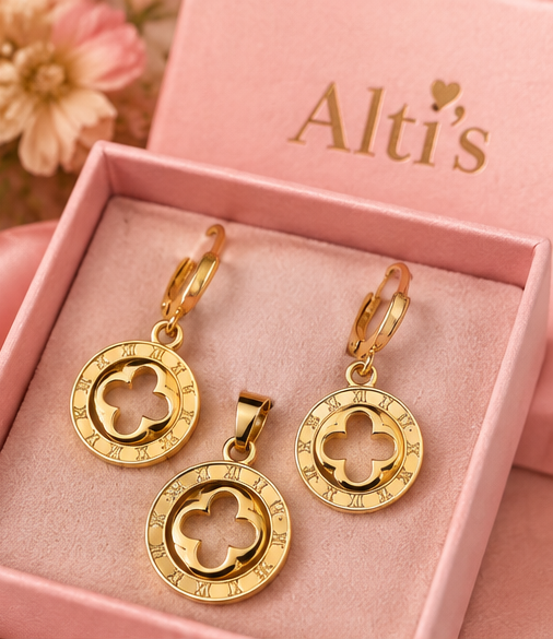 Lucky Clover earrings and pendant set displayed in Alti’s pink jewelry box