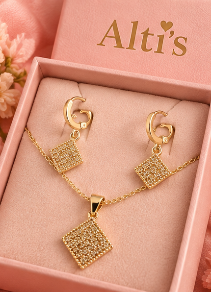 Alti’s Golden Sparkle Earrings & Pendant Set styled image 2; chain for styling only, not included