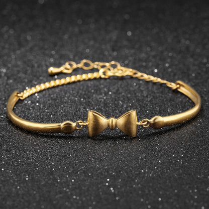💎 Dainty Gold Bow Bangle
