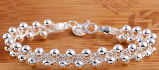 💎 Luminous Silver Woven Bracelet