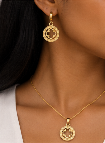 Styled Lucky Clover earrings and pendant on model; chain shown for styling only and not included