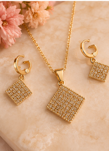 Alti’s Golden Sparkle Earrings & Pendant Set styled image 5; chain for styling only, not included