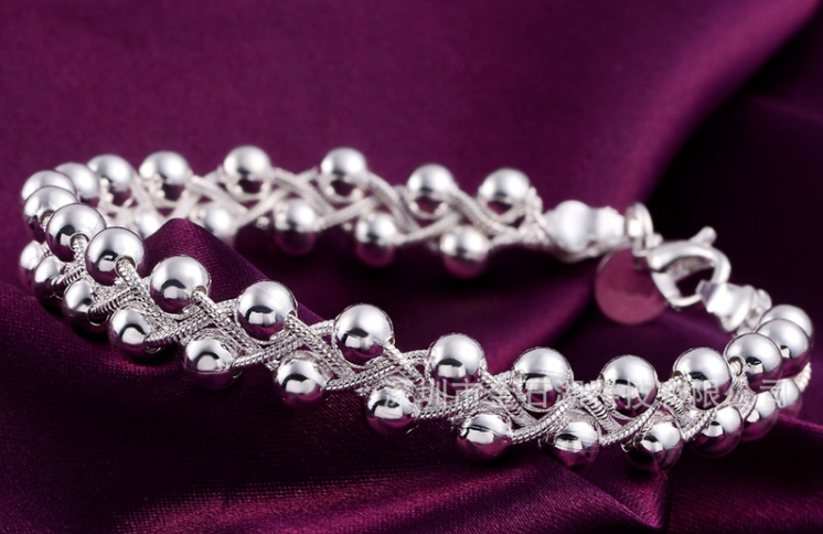 💎 Luminous Silver Woven Bracelet